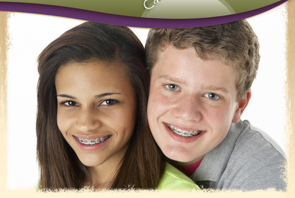 smiling teen boy and girl with braces